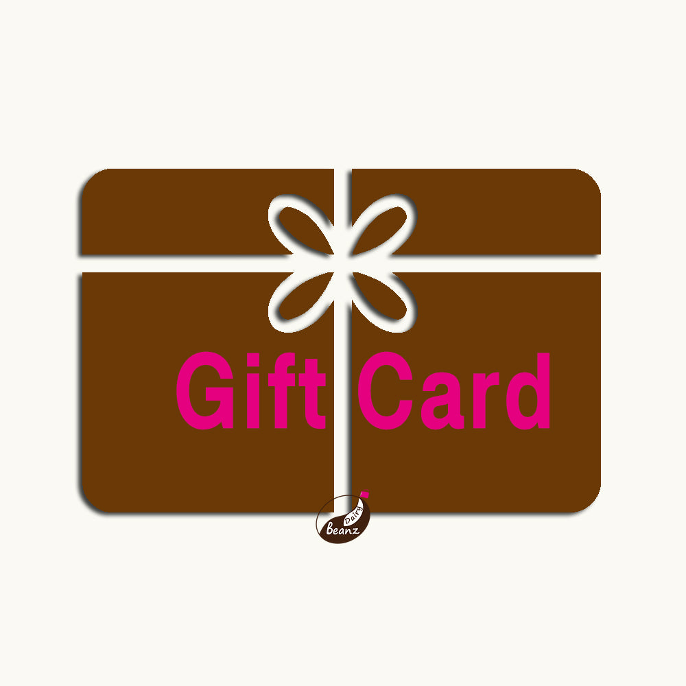 A coffee-colored gift card featuring the Dairy Beanz logo with pink "Gift Card" text.
