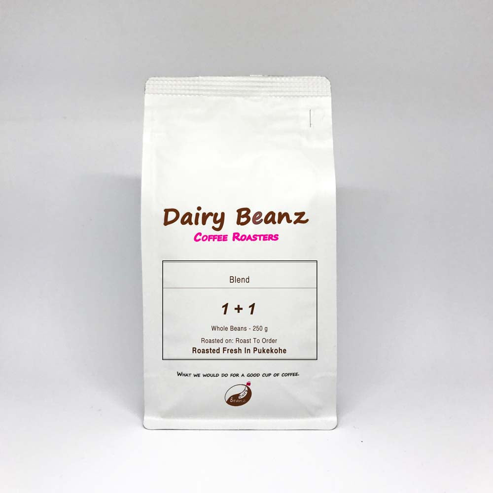 A bag of '1 Plus 1' espresso blend coffee with simple and elegant packaging design.