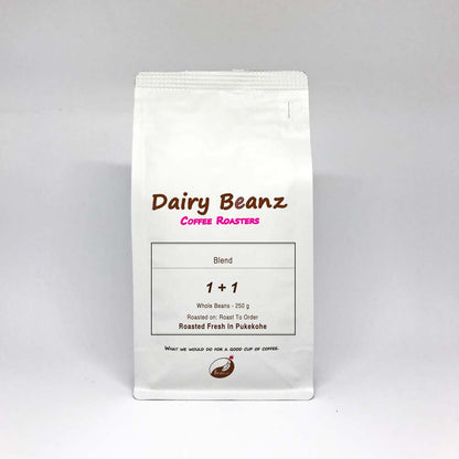 A bag of '1 Plus 1' espresso blend coffee with simple and elegant packaging design.