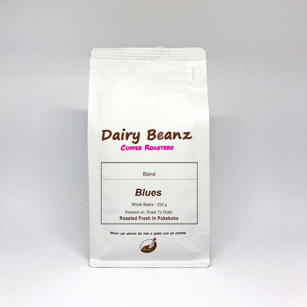 A bag of 'Blues' espresso blend coffee with simple and elegant packaging design.