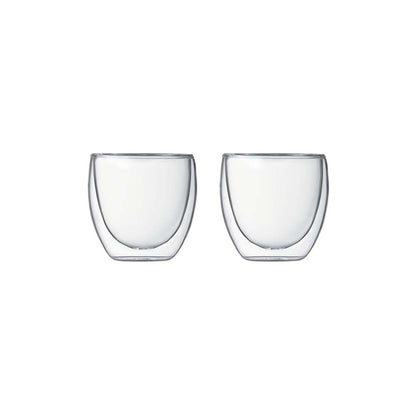 A set of two BODUM’s proprietary Double Wall Glasses feature two walls of borosilicate glass, creating a highly effective layer of insulation.