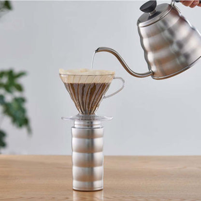 Hario V60 Soto Travel Mug fits perfectly under a V60 dripper and pouring hot water, brewing the favorite coffee.