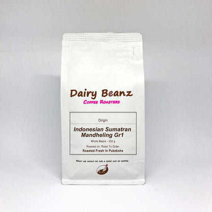 A bag of 'Indonesian Sumatran Mandheling Gr1' specialty single origin coffee beans with simple and elegant packaging design.