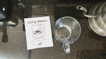 Beanz Drip step-by-step effortless brewing guide. Hang the cup drip filter sachet, pour hot water, and savor a delicious, aromatic coffee in seconds.