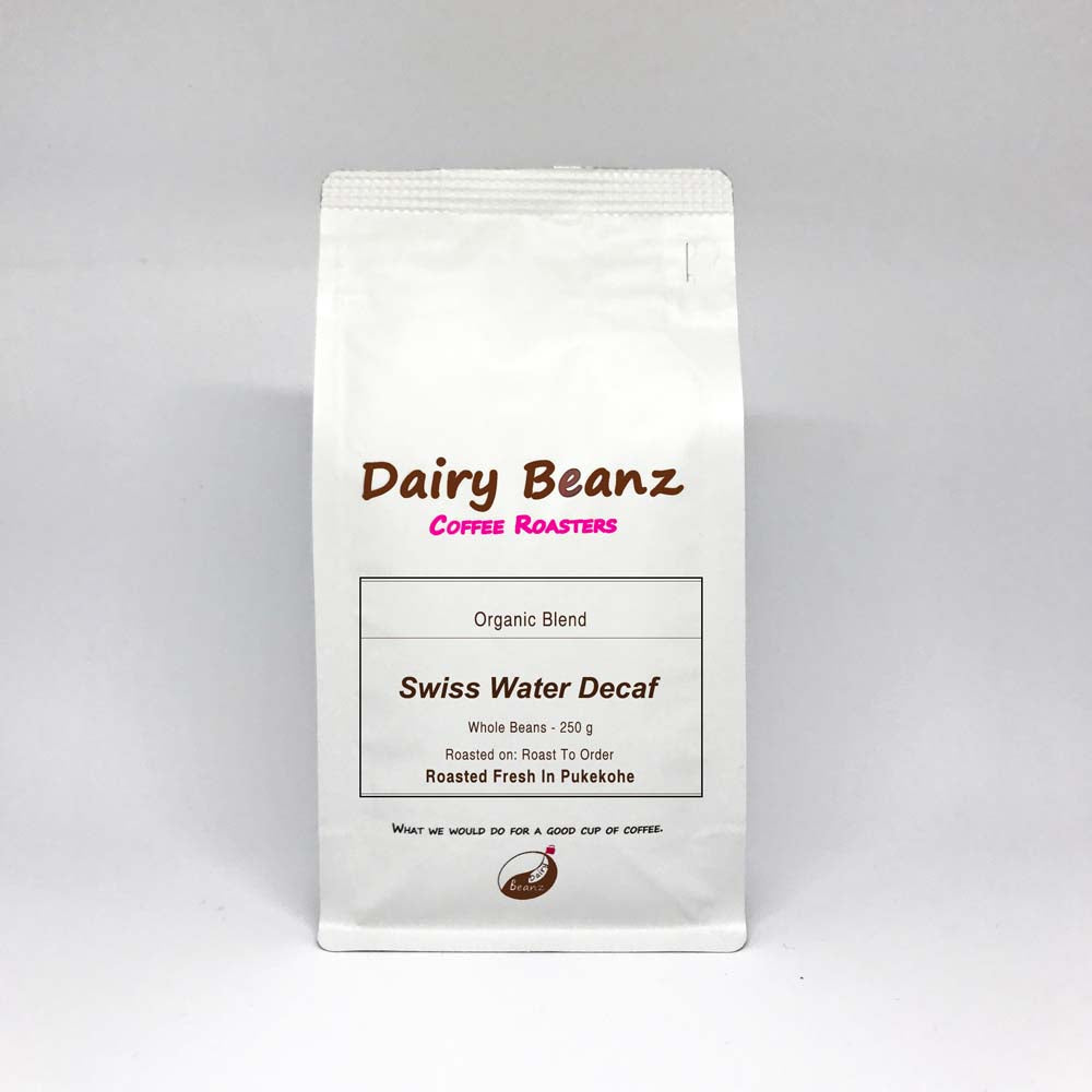 A bag of 'Swiss Water Decaf' organic espresso blend coffee with simple and elegant packaging design.